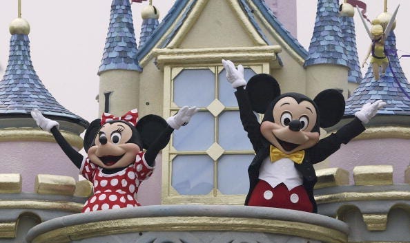 Disney characters Mickey Mouse and Minnie Mouse perform during the parade at Hong Kong Disneyland on September 11, 2005 in Hong Kong. The new theme park is scheduled to have its grand opening September 12