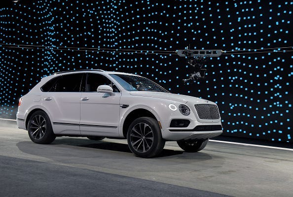 A Bentley Bentayga is shown during a speed test against Faraday Future's FF 91 prototype electric crossover vehicle (not shown) during the FF 91's unveiling at a press event for CES 2017 at The Pavilions at Las Vegas Market on January 3, 2017 in Las Vegas