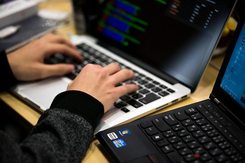 OKYO, JAPAN - JANUARY 28: A participant uses a laptop computer as he takes part in the Seccon 2016 final competition on January 28, 2017 in Tokyo, Japan. 24 teams from Japan, the US, China, Taiwan, South Korea, Russia, Poland, Switzerland and France compe