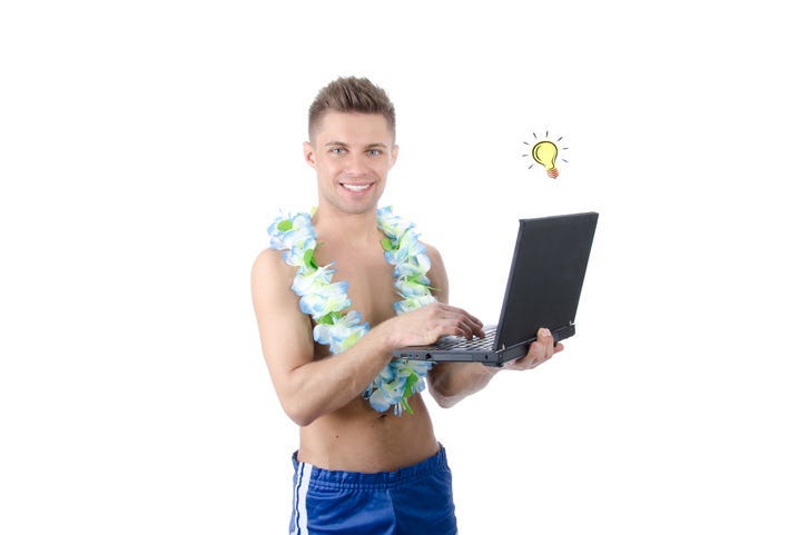 Holiday and relaxation. Work on vacation. Young attractive man holding a laptop. Isolated. White background.