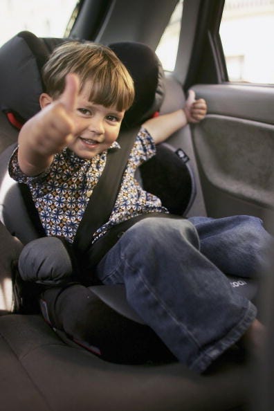 Charlie Woodhouse gestures from his new child seat