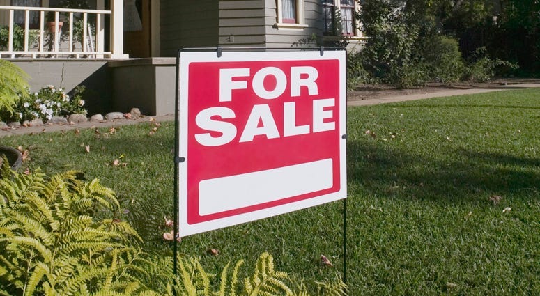 Home for sale sign