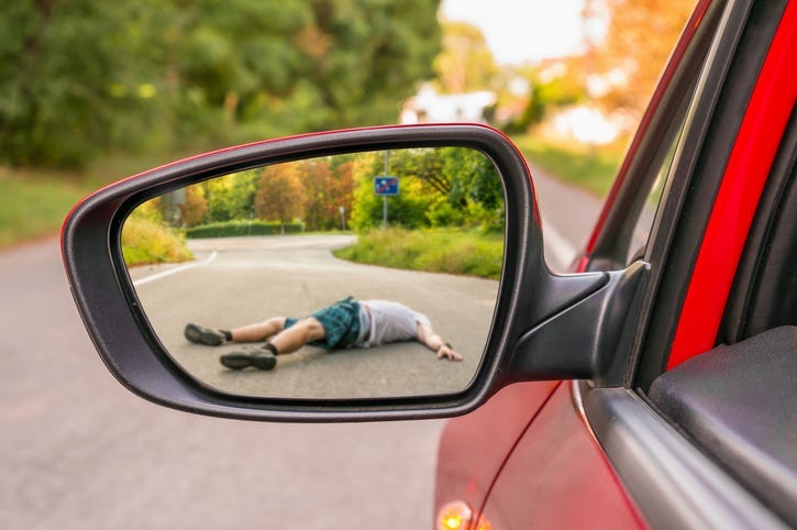 Rearview mirror with a man hit by a car