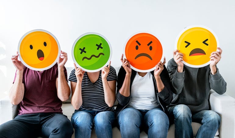 Adults with emoji faces
