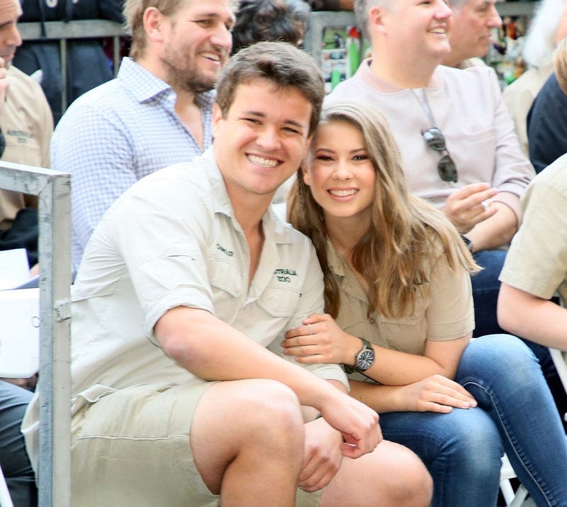 Bindi Irwin embraces her fiance Chandler Powell