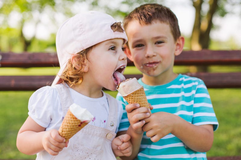 Kids Sharing Ice Cream