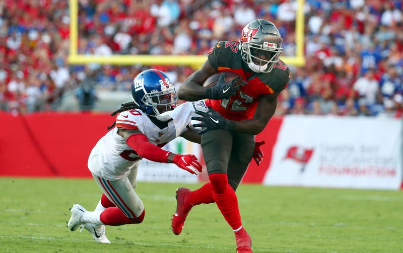 Chris Godwin avoids a tackle against the Giants in Week 3.
