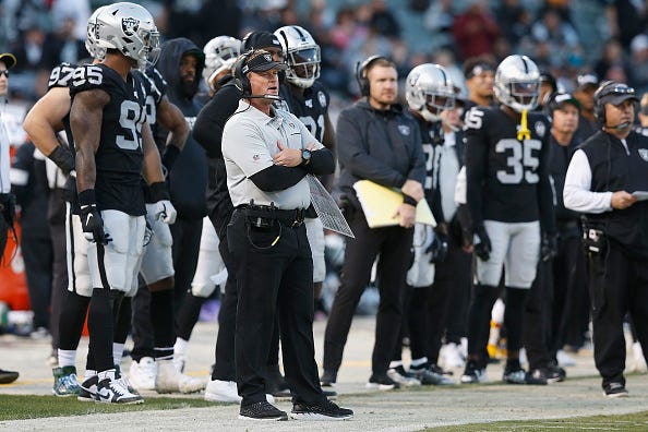 Jon Gruden commands the Raiders from the sideline.