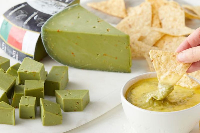 A wedge of green guacamole cheese from Dairy Dairy of Holland