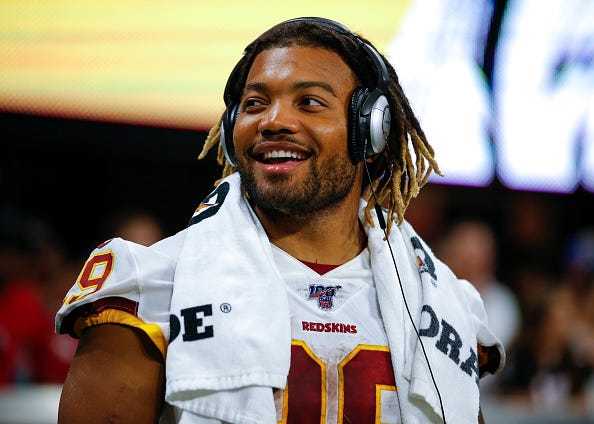 Redskins RB Derrius Guice listens to music before a preseason game.