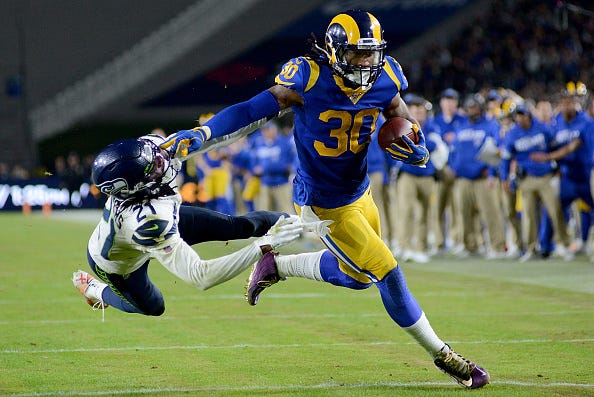 Rams RB Todd Gurley breaks a tackle.