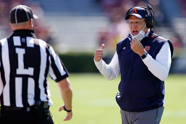 Gus Malzahn argues with an official during an Auburn game.