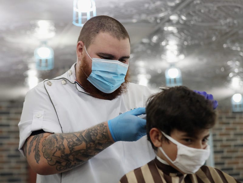 Outdoor haircuts allowed in CA but some stylists skirt restrictions