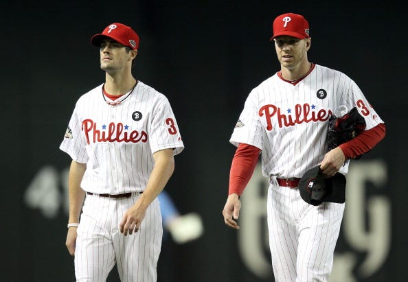 Cole Hamels and Roy Halladay at the 2011 MLB All-Star Game.
