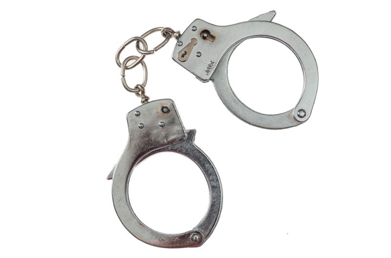 Metal handcuffs isolated on white background