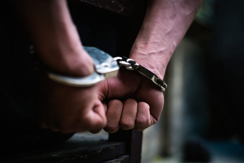 Handcuffed man