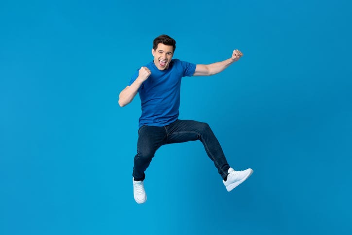 Man Jumping in Air with happiness