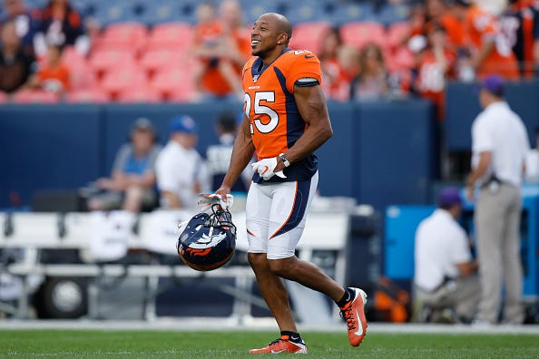 Broncos CB Chris Harris takes the field before a preseason game.
