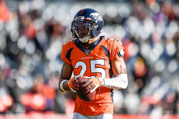 Chris Harris warms up before a Broncos game.