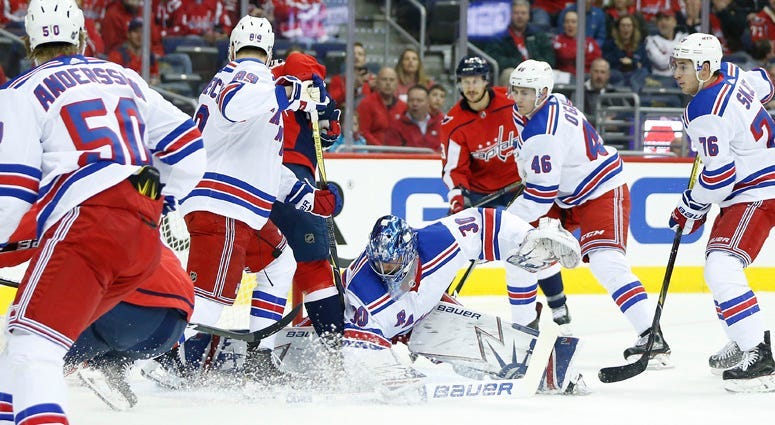 Rangers goaltender Henrik Lundqvist makes a save against the Washington Capitals on March 29, 2018, at Capital One Arena in Washington.