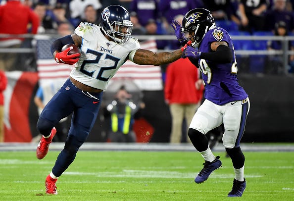 Titans RB Derrick Henry stiff arms Earl Thomas out of the way on a big run.