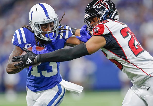 T.Y. Hilton throws a stiff arm on a Falcons safety in Week 3.