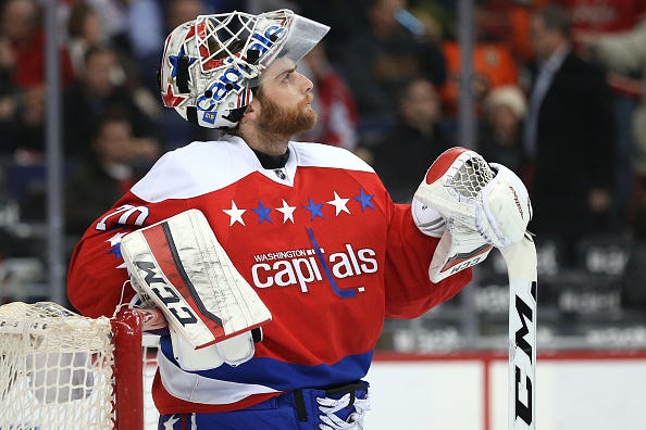 Braden Holtby gazes at the scoreboard during a Capitals game.