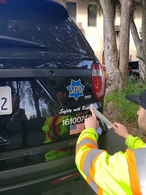 The new motto of the San Francisco Police Department — "Safety and Respect" — has been added to patrol cars.
