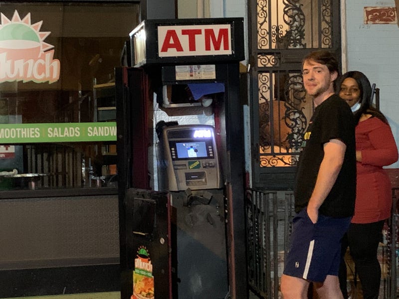 Brewerytown residents Lorette Willis and Marc Rademaker heard explosions overnight as looters tried to blow up ATMs.