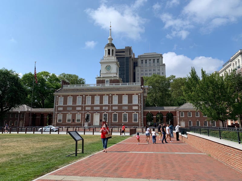 Though Independence Hall is closed to visitors, tourists still come to see it and snap photos.
