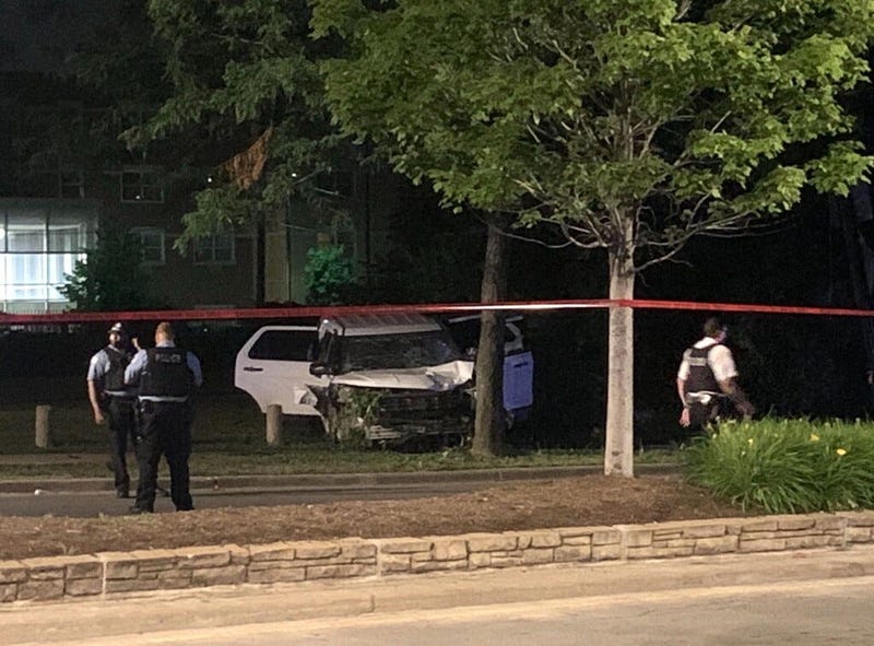Chicago police investigate a scene where a man on a motorized scooter was fatally struck by an unmarked CPD vehicle July 8, 2020, in the 11800 block of South Halsted Street.