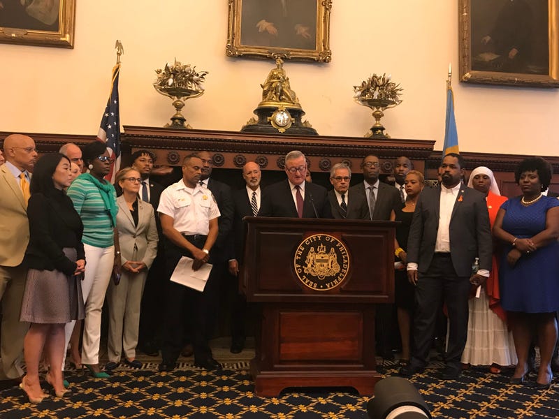 City, state and federal officials speak from Philadelphia City Hall about the shooting incident on Wednesday.