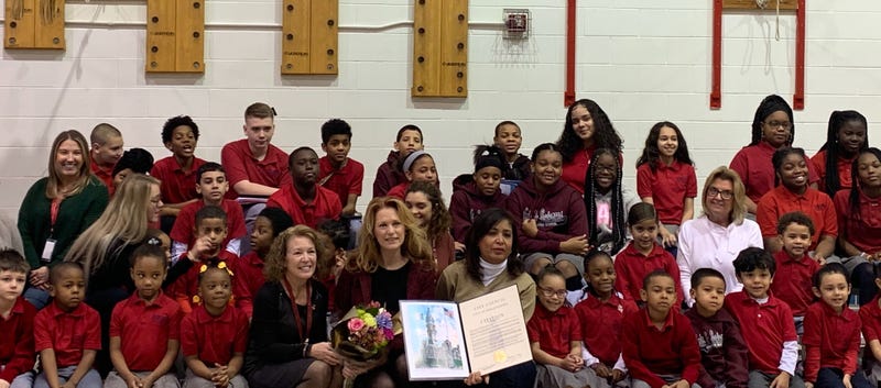 Lisa Weidman, a nurse at Philadelphia Charter School for Arts and Sciences, is honored for saving a student's life.