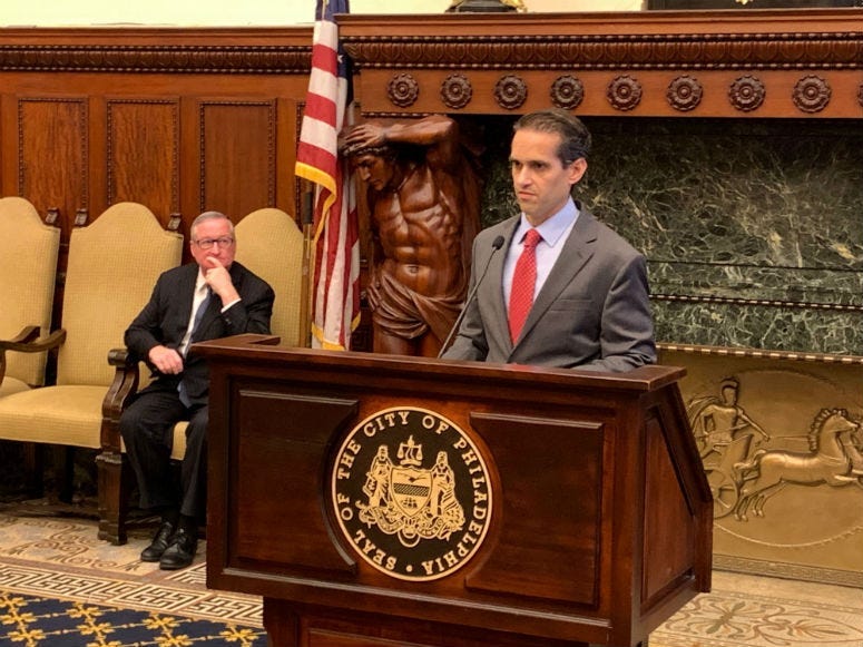 Commissioner of Records Jim Leonard speaking at a press conference.