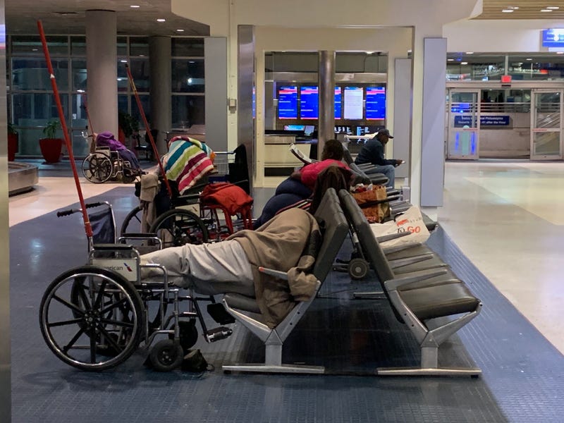 Dozens of homeless have taken up residence at Philadelphia International Airport, but a new rule limiting access to passengers and workers effective Friday has officials working to relocate them.