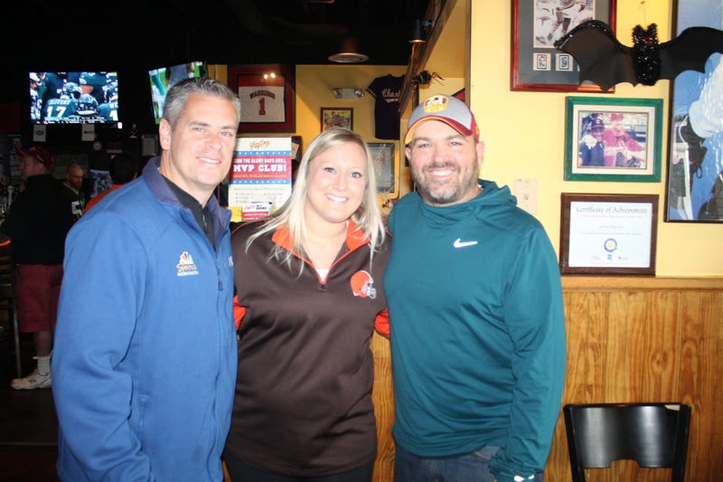 JP and Cakes from The Sports Junkies as well as 106.7 The Fan Street Team, chats with Skins fans at Glory Days Grill in Centreville, Va before kickoff.