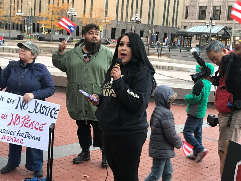 Ashley Quinones at rally for her husband killed by police