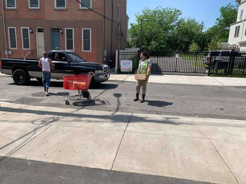 Volunteers provide food to communities whose grocery stores were looted, destroyed.