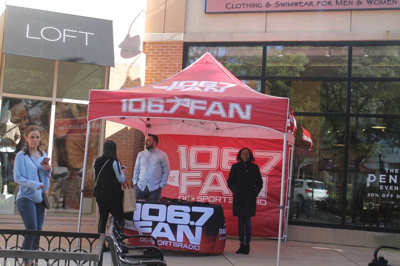 Danny Rouhier and 106.7 The Fan Street Team interacted with listeners at South Moon Under in Arlington, Virginia.