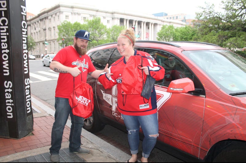 The 106.7 The Fan Street Team hangs out with fans before the Capitals vs. Penguins game at the Capitol One Arena.