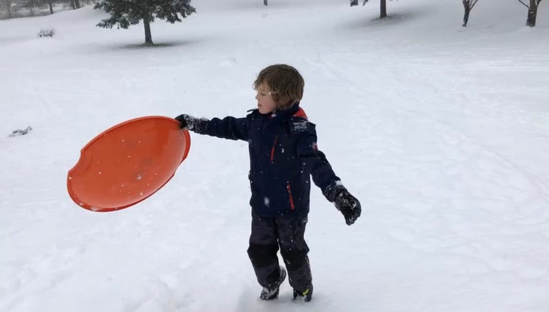 Dawson with a snow saucer