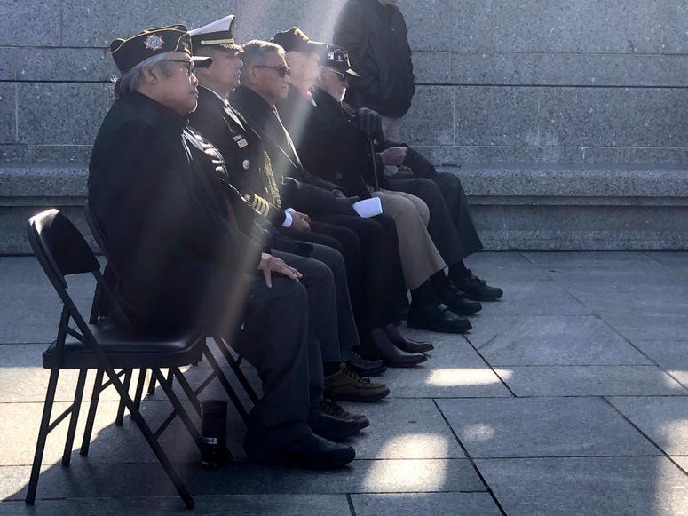 World War II veterans, military attachés from Australia and the Philippines, and civilians laid wreaths at the National World War II Memorial in Washington as part of an event commemorating the 75th anniversary of the Battle of Luzon, Jan. 9, 2020.