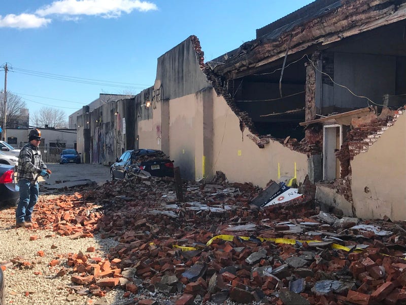 Officials say the wind is to blame for a partial building collapse at Fifth and Master streets in Kensington.