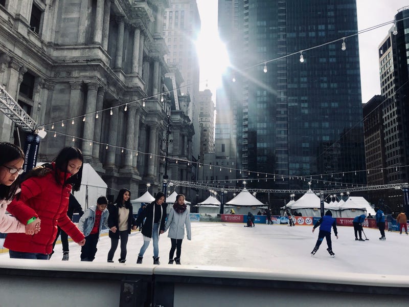 Visitors enjoy ice skating at Dilworth Park on Christmas Day.