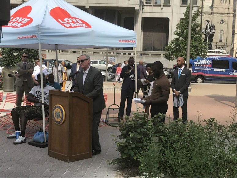 Philadelphians from all walks of life walk together as they call for end to the city's gun violence epidemic.