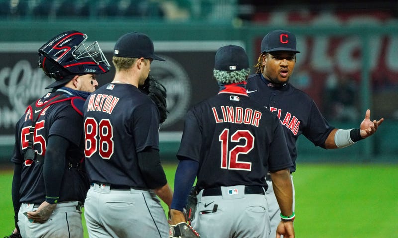 Cleveland Indians third baseman Jose Ramirez (11) gestures to the Kansas City Royals dugout during the seventh inning at Kauffman Stadium.