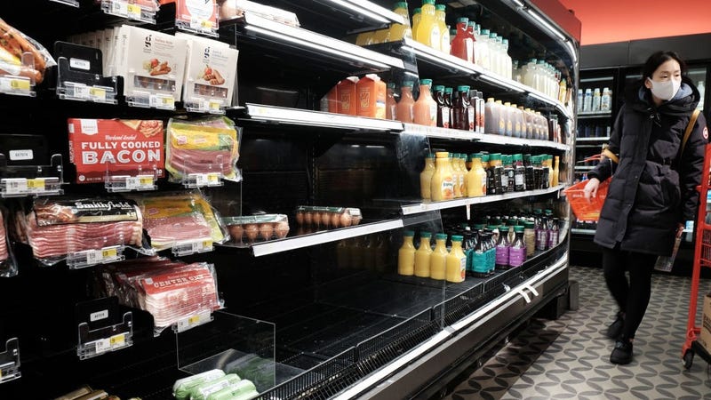 People shop for groceries in a Manhattan store on January 12, 2022 in New York City. Newly released data shows that inflation grew at its fastest 12-month pace in nearly 40 years during the month of December.