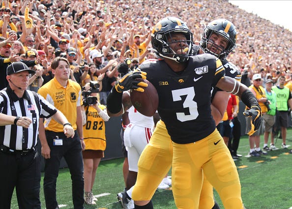 Iowa receiver Tyrone Tracy celebrates a TD against Rutgers.