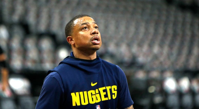 Isaiah Thomas with the Denver Nuggets