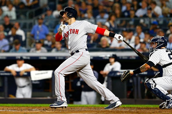 J.D. Martinez skies a sac fly against the Yankees.